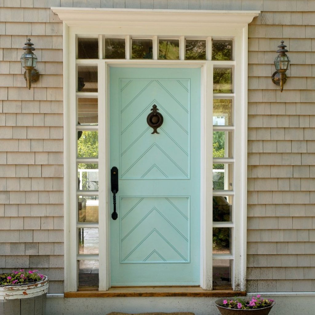 front door trends - pale turquoise door with cheveron geometric pattern